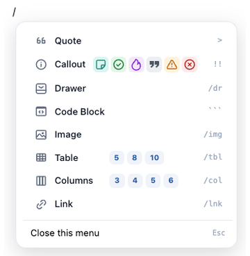 The / menu scrolled to Quote, Callout, Drawer, Code Block, Image, Table, Columns, and Link